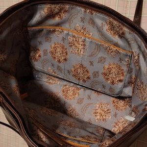 Excellent condition. Hobo shoulder bag. Brown. 10 by 18". Imperfections in leath